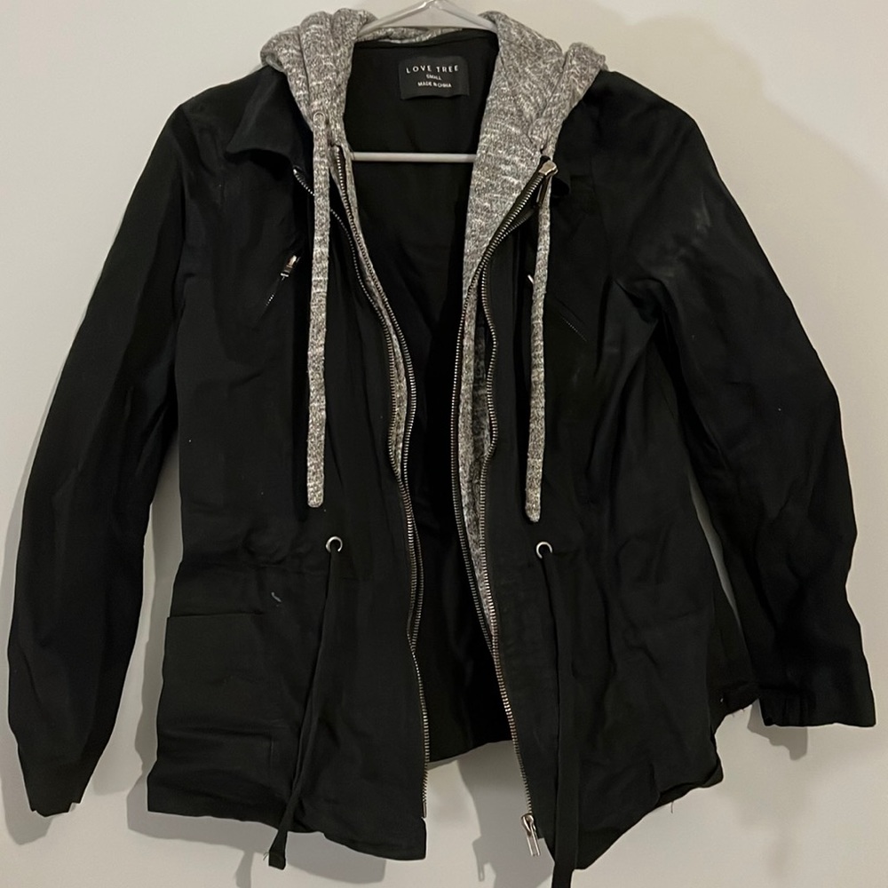 Small black jacket layered with grey